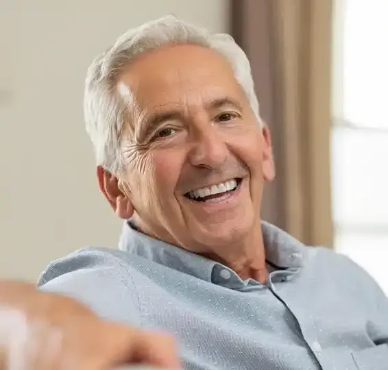 Friendly dentist discussing the Urban Dental Studio membership plan with a smiling patient in Clarksburg, MD